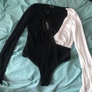 Black and white long sleeve body suit